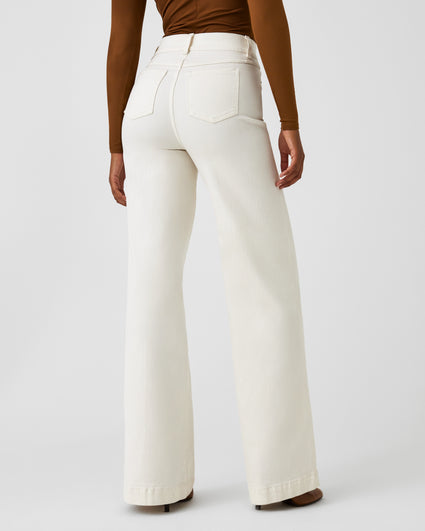 Timeless silhouettes, summer edition… The Seamed-Front Wide Leg Pant in  Ecru pairs well with any sunset #Spanx #WideLegPants #WhitePan