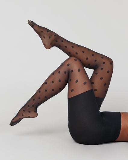 Woman Wearing Black Polka Dots Stockings High-Res Stock Photo